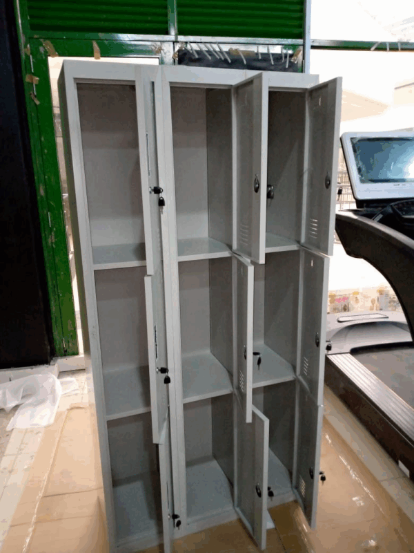 sleek 9-door office locker, 9-door storage locker, office locker with 9 compartments, modern 9-door metal locker, steel 9-door cabinet, multi-door office storage locker, 9-door employee locker, compact 9-door locker cabinet, secure 9-door office storage, sleek metal locker with 9 doors, 9-compartment office locker, 9-door personal storage locker, modular 9-door locker unit, 9-door locker for staff rooms, industrial 9-door locker cabinet, vertical 9-door locker for office, 9-locker cabinet for workplace, contemporary 9-door locker design, slim 9-door locker system, durable 9-door security locker