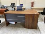 140cm curved office desk, 1400mm ergonomic desk Kenya, curved workstation Nairobi, modern executive computer desk, office desk with curved front, compact managerial desk, space-saving corner office table, corporate office furniture Kenya, premium office desks Nairobi, ergonomic workstation design, 1.4m staff desk, curved executive table, sleek office furniture, modern study desk, small office workstation, durable computer table, wire management curved desk, metal frame office table, melamine curved desk, scratch-resistant office desk, home office curved table, commercial office furniture, affordable office desks, stylish computer workstation, posture-friendly office desk, executive office fit-outs, office supplies Nairobi, wholesale office desks, retail furniture showroom, custom office furniture Kenya, ergonomic curved table, compact corporate desk, professional workspace furniture, contemporary office design, small space office desk, office desk with grommets, heavy duty steel frame desk, thick wooden desktop table, eco-friendly office furniture, anti-scratch surface desk, moisture-resistant office table, termite-proof executive desk, built-in power socket desk, USB port office desk, modesty panel executive table, mobile pedestal drawer combo, 3-drawer office desk, filing pedestal integration, central locking system desk, premium home office desk, study room corner table, executive computer desk, multi-monitor office workstation, contemporary office furniture Kenya, high-end managerial desk, executive suite office table, custom office desks Nairobi, bespoke corner workstations, imported office furniture Kenya, Italian design office desks, German engineered office tables, commercial grade curved desk, heavy-gauge steel frame desk, workspace optimization solutions, corporate office redesign, startup office furniture Kenya, tech hub workspace desks, co-working space curved tables, incubator office furniture, law firm executive desks, banking hall manager tables, insurance corporate office furniture, SACCO executive tables, microfinance office desks, NGO management workstations, embassy executive furniture, government ministry office tables, county assembly executive desks, public sector office supply, university administration desks, college management tables, school principal office desk, hospital administration desks, pharmaceutical corporate furniture, research institute executive desks, hotel management office tables, luxury lodge manager desks, resort administrative furniture, casino management office, golf club administration desk, sports federation office furniture, aviation company executive desks, port authority office tables, shipping line executive workstations, logistics hub management desks, manufacturing plant office tables, tea factory manager desks, coffee milling executive tables, flower farm corporate desks, horticulture headquarters furniture, supermarket chain head office desk, retail franchise management table, construction company executive desks, architectural firm workstations, engineering consultancy desks, real estate agency manager tables, property management office desks, digital marketing agency workstations, software development office tables, gaming studio executive desks, media house management tables, TV station executive desks, radio station manager tables, publishing house office desks, printing press management tables, security firm executive desks, event planning office furniture, catering company management desks, cleaning services headquarters desk, waste management office furniture, water board executive desks, electricity provider headquarters table, telecommunications office workstations, mobile network operator desks, solar energy firm conference desks, wind energy office tables, oil and gas corporate desks, mining company regional office, geological survey office tables, drilling camp administrative desk, petroleum depot administration table, chemical plant executive desks, textile mill management tables, food processing plant desks, beverage factory executive tables, bottling plant management desks, dairy plant executive tables, animal feed plant office furniture, slaughterhouse administration desks, fishing port office furniture, cold storage facility desks, transport company conference tables, bus company headquarters furniture, matatu sacco office desks, delivery service hub tables, courier service headquarters desk, fulfillment center workstations, warehouse management office desks, cargo handling office furniture, customs bonded warehouse desks, clearing and forwarding desks, shipping agent meeting tables, freight forwarder office desks, airline operations workstations, tour operator executive tables, travel agency office desks, hotel front office manager table, lodge administration meeting tables, resort staff office desks, restaurant management desks, bar corporate office table, nightclub management furniture, exhibition booth office tables, conference center management desks, auditorium backstage office tables, theater management desk, cinema corporate office tables, amusement park administration desk, water park corporate desks, yacht club committee tables, equestrian center office desk, racecourse administration office, sports stadium office tables, athletics training camp tables, boxing gym office furniture, crossfit box office furniture, yoga studio administration table, wellness center management tables, aesthetic clinic executive desk, dermatology clinic office tables, optical shop management tables, physiotherapy clinic desks, chiropractic office conference tables, holistic healing center desks, veterinary clinic executive desk, pet grooming corporate tables, florist shop management desks, jewelry store corporate office, watch repair shop administration, electronics repair corporate desks, phone repair workshop office, computer lab administration desk, photography studio office tables, musical instrument corporate office, sound equipment management tables, lighting gear corporate tables, DJ equipment office desks, film production office desk, broadcasting corporate office, printing press administration desk, bookbindery management tables, signage workshop corporate office, carpentry workshop administration, metal fabrication corporate tables, welding shop management desks, plumbing supplies corporate office, electrical workshop administration, HVAC contractor office desks, painting contractor office desks, roofing material corporate office, landscaping firm office desk, surveying office tables, urban planning office desks, interior design studio tables, event management office desks, catering services corporate desk, security services office desks, pest control corporate office, residential developer office desks, home office executive desks, luxury villa study tables, penthouse executive desk setup, duplex home office furniture, apartment complex management office, gated community administration desks, county commissioner office desk, Huduma center office tables, law court administration desks, police headquarters office desk, prison administration office tables, military base briefing tables, defense forces strategy desks, security firm command center tables, fire station office desks, coast guard operations room desks, port logistics office desk, clearing house office tables, freight terminal conference desks, airport lounge office desk, railway terminus office tables, bus terminal management desks, petrol station corporate office, supermarket chain strategy tables, hardware store office desks, bookstore management desks, pharmacy corporate office desks, bakery head office furniture, butchery administration desks, tailoring workshop management, fashion studio office desk, recording studio control room tables, media house strategy room, tech incubator office desks, fintech office desks, digital banking headquarters, crypto hub office tables, blockchain startup office furniture, venture capital office desk, private equity firm desks, investment bank office tables, stock brokerage office desk, asset management office tables, wealth advisory office tables, rating agency office desk, economic consulting desks, public relations firm desks, advertising agency office tables, branding agency office desks, media buying corporate office, creative agency office desk, design consultancy tables, research agency office room, polling firm office desks, think tank office tables, policy institute office desks, academic institution office desk, school board office tables, vocational training office desk, technical institute office desks, driving school management tables, language center office desks, boarding school administration, youth camp management tables, religious center office desk, church administration office desks, mosque management tables, NGO project office desk, community center management, youth group office tables, charity organization office desks, diplomatic mission office tables, UN agency office desks, international NGO logistics desk, humanitarian aid office tables