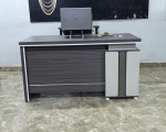 1.4M executive office desk, best executive desks Kenya, modern 1.4 meter office desk Nairobi, affordable manager desk Kenya, wooden executive office table, compact executive desk Nairobi, premium office furniture Kenya, executive workstation 1.4m, contemporary director desk, home office executive desk, commercial office furniture Nairobi, executive office table with drawers, high-end office desks Kenya, stylish management desk, small executive desk Nairobi, luxury office furniture Kenya, minimalist executive desk, durable office tables Nairobi, office desk suppliers Kenya, custom executive desks Nairobi, 140cm office desk, medium executive workstation, executive desk with modesty panel, manager desk with cable management, L-shaped executive desk 1.4m, straight executive office table, executive desk with side return, presidential office desk Kenya, CEO office table Nairobi, boss desk furniture, office furniture wholesale Kenya, factory direct office desks, executive office fit-outs, executive table and chair sets, office desk manufacturers Nairobi, office furniture showroom Kenya, buy office desks online Nairobi, executive desk with mobile pedestal, lockable manager desk, executive desk with drawers and shelf, melamine executive desk, high gloss executive table, solid wood office desk, veneer office furniture, steel frame executive desk, metal leg manager desk, glass top executive desk, modern CEO table, executive desk delivery Nairobi, office furniture installation Kenya, corporate office desks, business office furniture, professional workspace desks, upscale office tables, executive office makeover, executive room furniture Kenya, ergonomic manager desks, administrative office desks, supervisor desk Kenya, head of department office desk, private office furniture, executive suite desks, premium wood finish desks, dark walnut executive desk, oak finish office table, mahogany executive desk, white office desk Nairobi, black executive desk, grey manager table, modern minimalist office furniture, industrial style executive desk, rustic office furniture Kenya, contemporary office tables, executive writing desk, executive computer desk, laptop friendly office desk, executive office table with wire grommets, integrated power socket office desk, executive desk with keyboard tray, scratch resistant office desk, waterproof office tables, heavy-duty office desks, commercial grade executive furniture, executive desk sale Kenya, cheap office desks Nairobi, second hand executive desks, refurbished office furniture Kenya, executive desk rental Nairobi, corporate relocation furniture, office interior design Kenya, bespoke office furniture, made-to-order executive desks, custom carpentry office furniture, wood and metal office desks, classic executive desk, retro office furniture, vintage style manager desk, Scandinavian office furniture Kenya, urban office design, luxury corporate furniture, high-profile office desks, institutional office furniture, executive board room desks, conference and executive desks, modular executive workstations, open plan executive desks, executive benching systems, private workspace desks, executive hub tables, multi-user executive desks, executive meeting tables, small conference tables, managerial meeting desks, executive consultation table, reception executive desk, luxury reception counter, executive secretary desk, assistant manager desk, clerical office desks, back office furniture, administrative workstations, departmental office tables, human resources desk, finance office furniture, marketing executive desk, IT manager desk, legal office furniture Kenya, law firm executive desks, accounting office tables, consultancy office desks, real estate agency furniture, banking hall office desks, insurance office furniture, medical executive desk, hospital administration desk, school director office table, university dean desk, principal office furniture, church administration desk, NGO office furniture Kenya, startup office desks Nairobi, tech hub office furniture, co-working space executive desks, shared office manager tables, hot desking executive spots, executive touchdown desks, temporary office desks, mobile office furniture, collapsible office desks, folding manager tables, stackable office furniture, space saving executive desks, small space office solutions, corner executive desks, wall-mounted office desks, floating executive desk, multi-tier office tables, executive desk with hutch, bookshelf integrated executive desk, office storage combination desks, executive desk with open shelving, glass door executive cabinets, executive credenza tables, matching office credenzas, executive low cabinets, executive high storage units, filing cabinet desks, executive wardrobe cabinets, office coat racks, executive guest chairs matching, visitor chairs for executive office, leather executive chairs, high back manager chairs, ergonomic executive seating, plush office armchairs, executive lounge seating, office sofa sets for executive rooms, coffee tables for executive office, executive room decor, office branding for executive desks, custom logo office furniture, executive desk name plates, desk organizers for executive tables, leather desk pads, cable management spines, under-desk cable trays, monitor arms for executive desks, dual monitor executive mounts, laptop stands for office desks, desk lamps for executive tables, executive task lighting, ambient office lighting, executive flooring solutions, office carpets for manager rooms, wooden parquet office flooring, luxury vinyl tiles office, executive wall paneling, acoustic panels for executive offices, soundproof manager rooms, glass partition office walls, aluminum framed partitions, double glazed office partitions, frosted glass executive offices, automated blinds for executive rooms, smart office furniture, motorized office desks, sit-stand executive desks, adjustable height manager tables, electric standing desks 1.4m, memory preset standing desks, health-conscious office furniture, active sitting office desks, wellness office furniture Kenya, ergonomic workplace accessories, posture-correcting office gear, premium office ergonomics, luxury workspace solutions, elite office furniture Kenya, prestigious office desks, signature collection office furniture, artisan crafted office desks, handcrafted executive tables, local furniture manufacturing Kenya, buy local furniture Kenya, support local woodworking Nairobi, industrial area furniture makers, Mombasa road furniture stores, Ngong road office furniture, Westlands office furniture shops, Upperhill executive furniture, Kilimani office suppliers, CBD Nairobi furniture outlets, Thika road office furniture, Kiambu road furniture showrooms, Kitengela office furniture dealers, Machakos office suppliers, Nakuru furniture distributors, Eldoret office outfitters, Kisumu corporate furniture, Mombasa office furniture shops, Diani office suppliers, Malindi furniture dealers, Naivasha conference furniture, Nyeri office outfitters, Meru furniture suppliers, Embu office dealers, Kericho corporate furniture, Kakamega office outfitters, Bungoma furniture suppliers, Busia office dealers, Kisii corporate furniture, Migori office outfitters, Homa Bay furniture suppliers, Siaya office dealers, Kitui corporate furniture, Isiolo office outfitters, Garissa furniture suppliers, Wajir office dealers, Mandera corporate furniture, Lamu office outfitters, Taita Taveta furniture suppliers, Kwale office dealers, Kilifi corporate furniture, Turkana office outfitters, Marsabit furniture suppliers, Samburu office dealers, Baringo corporate furniture, Laikipia office outfitters, Nyandarua furniture suppliers, Murang'a office dealers, Narok corporate furniture, Voi office outfitters, Namanga furniture suppliers, Lunga Lunga office dealers, Malaba corporate furniture, Tatu city office suppliers, Konza technocity office dealers, Athi river EPZ furniture suppliers, Ruiru office outfitters, Juja furniture suppliers, Ongata Rongai office dealers, Ngong corporate furniture, Karen office outfitters, Langata furniture suppliers, Kibera office dealers, Dagoretti corporate furniture, South B office outfitters, South C furniture suppliers, Madaraka office dealers, Donholm corporate furniture, Umoja office outfitters, Kayole furniture suppliers, Buruburu office dealers, Embakasi corporate furniture, Gigiri office outfitters, Runda furniture suppliers, Muthaiga office dealers, Loresho corporate furniture, Spring Valley office outfitters, Kitisuru furniture suppliers, Nyari office dealers, Kileleshwa corporate furniture, Hurlingham office outfitters, Eastleigh furniture suppliers, Industrial area office dealers, Riverside drive corporate furniture, Lavington office outfitters, Arboretum furniture suppliers, Parklands office dealers, Milimani corporate furniture, Tom Mboya street furniture shops, Moi avenue office suppliers, Kimathi street furniture dealers, Kenyatta avenue office showrooms, Haile Selassie avenue furniture, Uhai highway office outfitters, Enterprise road furniture makers, Dar es Salaam road furniture shops, Lusaka road office suppliers, Ladhani road furniture dealers, Likoni road office showrooms, Ring road office furniture, James Gichuru road furniture makers, Waiyaki way office furniture, Limuru road office suppliers, Kiambu road furniture dealers, Magadi road office showrooms, Kajiado road office furniture, Namanga road furniture makers, Garissa road office furniture, Kisumu road office suppliers, Eldoret road furniture dealers, Nakuru highway office showrooms, Nyeri road office furniture, Meru highway office makers, Thika superhighway office furniture, Southern bypass office suppliers, Eastern bypass office furniture dealers, Northern bypass office showrooms