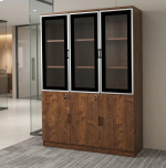 Nairobi Office Mart Wooden Office Cabinet Prices In Kenya 3-Door Wooden Office Cabinet – Stylish, Spacious & Functional Storage Keep your workspace neat and organized with the 3-Door Wooden Office Cabinet. Designed for modern offices, it combines practical storage with a professional appearance. Its wooden finish adds warmth and elegance to your office interior. Therefore, it is an excellent choice for corporate offices, home offices, and business environments. The 3-door office cabinet provides convenient storage for documents, files, stationery, and other office essentials. Its multiple doors help keep your belongings neatly arranged and out of sight. As a result, you can maintain a clean and clutter-free workspace. It is ideal for professionals who need accessible storage for everyday office supplies. Built for practical office organization, this wooden storage cabinet helps maximize available space. You can use it to store files, folders, books, and important paperwork. Furthermore, its versatile design makes it suitable for executive offices, administrative departments, reception areas, and meeting rooms. It also pairs well with executive desks and other wooden office furniture. The wooden office storage cabinet offers a professional look that complements different office layouts. Its three-door design provides a convenient way to organize items according to your needs. Additionally, the cabinet helps keep essential documents in one central location. This makes daily office activities easier and more efficient. Whether you are furnishing a new office or upgrading your existing workspace, the 3-Door Wooden Office Cabinet is a practical addition. Its combination of storage capacity, functionality, and timeless styling makes it suitable for various professional settings. Choose this cabinet to create a more organized and attractive working environment. Key Features Three-Door Design: Provides convenient access to stored office essentials. Spacious Storage: Ideal for files, folders, documents, stationery, and books. Wooden Finish: Adds a classic and professional touch to your office. Organized Workspace: Helps reduce clutter and keeps supplies neatly stored. Versatile Application: Suitable for corporate offices, home offices, and administrative spaces. Professional Appearance: Complements executive desks and other office furniture. Practical Functionality: Keeps everyday office essentials accessible and organized. Improve Your Office Organization Today Choose the 3-Door Wooden Office Cabinet for a practical and stylish storage solution. It helps maintain a tidy workspace while enhancing your office interior. Moreover, its versatile design makes it suitable for businesses of different sizes. Add this wooden office cabinet to your furniture collection and enjoy a more organized, professional working environment.