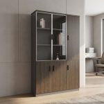 Nairobi Office Mart Wooden Office Cabinet Prices In Kenya 3-Door Wooden Office Cabinet – Stylish, Spacious & Functional Storage Keep your workspace neat and organized with the 3-Door Wooden Office Cabinet. Designed for modern offices, it combines practical storage with a professional appearance. Its wooden finish adds warmth and elegance to your office interior. Therefore, it is an excellent choice for corporate offices, home offices, and business environments. The 3-door office cabinet provides convenient storage for documents, files, stationery, and other office essentials. Its multiple doors help keep your belongings neatly arranged and out of sight. As a result, you can maintain a clean and clutter-free workspace. It is ideal for professionals who need accessible storage for everyday office supplies. Built for practical office organization, this wooden storage cabinet helps maximize available space. You can use it to store files, folders, books, and important paperwork. Furthermore, its versatile design makes it suitable for executive offices, administrative departments, reception areas, and meeting rooms. It also pairs well with executive desks and other wooden office furniture. The wooden office storage cabinet offers a professional look that complements different office layouts. Its three-door design provides a convenient way to organize items according to your needs. Additionally, the cabinet helps keep essential documents in one central location. This makes daily office activities easier and more efficient. Whether you are furnishing a new office or upgrading your existing workspace, the 3-Door Wooden Office Cabinet is a practical addition. Its combination of storage capacity, functionality, and timeless styling makes it suitable for various professional settings. Choose this cabinet to create a more organized and attractive working environment. Key Features Three-Door Design: Provides convenient access to stored office essentials. Spacious Storage: Ideal for files, folders, documents, stationery, and books. Wooden Finish: Adds a classic and professional touch to your office. Organized Workspace: Helps reduce clutter and keeps supplies neatly stored. Versatile Application: Suitable for corporate offices, home offices, and administrative spaces. Professional Appearance: Complements executive desks and other office furniture. Practical Functionality: Keeps everyday office essentials accessible and organized. Improve Your Office Organization Today Choose the 3-Door Wooden Office Cabinet for a practical and stylish storage solution. It helps maintain a tidy workspace while enhancing your office interior. Moreover, its versatile design makes it suitable for businesses of different sizes. Add this wooden office cabinet to your furniture collection and enjoy a more organized, professional working environment.