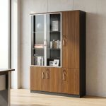 Nairobi Office Mart Wooden Office Cabinet Prices In Kenya 3-Door Wooden Office Cabinet – Stylish, Spacious & Functional Storage Keep your workspace neat and organized with the 3-Door Wooden Office Cabinet. Designed for modern offices, it combines practical storage with a professional appearance. Its wooden finish adds warmth and elegance to your office interior. Therefore, it is an excellent choice for corporate offices, home offices, and business environments. The 3-door office cabinet provides convenient storage for documents, files, stationery, and other office essentials. Its multiple doors help keep your belongings neatly arranged and out of sight. As a result, you can maintain a clean and clutter-free workspace. It is ideal for professionals who need accessible storage for everyday office supplies. Built for practical office organization, this wooden storage cabinet helps maximize available space. You can use it to store files, folders, books, and important paperwork. Furthermore, its versatile design makes it suitable for executive offices, administrative departments, reception areas, and meeting rooms. It also pairs well with executive desks and other wooden office furniture. The wooden office storage cabinet offers a professional look that complements different office layouts. Its three-door design provides a convenient way to organize items according to your needs. Additionally, the cabinet helps keep essential documents in one central location. This makes daily office activities easier and more efficient. Whether you are furnishing a new office or upgrading your existing workspace, the 3-Door Wooden Office Cabinet is a practical addition. Its combination of storage capacity, functionality, and timeless styling makes it suitable for various professional settings. Choose this cabinet to create a more organized and attractive working environment. Key Features Three-Door Design: Provides convenient access to stored office essentials. Spacious Storage: Ideal for files, folders, documents, stationery, and books. Wooden Finish: Adds a classic and professional touch to your office. Organized Workspace: Helps reduce clutter and keeps supplies neatly stored. Versatile Application: Suitable for corporate offices, home offices, and administrative spaces. Professional Appearance: Complements executive desks and other office furniture. Practical Functionality: Keeps everyday office essentials accessible and organized. Improve Your Office Organization Today Choose the 3-Door Wooden Office Cabinet for a practical and stylish storage solution. It helps maintain a tidy workspace while enhancing your office interior. Moreover, its versatile design makes it suitable for businesses of different sizes. Add this wooden office cabinet to your furniture collection and enjoy a more organized, professional working environment.