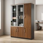 Nairobi Office Mart Wooden Office Cabinet Prices In Kenya 3-Door Wooden Office Cabinet – Stylish, Spacious & Functional Storage Keep your workspace neat and organized with the 3-Door Wooden Office Cabinet. Designed for modern offices, it combines practical storage with a professional appearance. Its wooden finish adds warmth and elegance to your office interior. Therefore, it is an excellent choice for corporate offices, home offices, and business environments. The 3-door office cabinet provides convenient storage for documents, files, stationery, and other office essentials. Its multiple doors help keep your belongings neatly arranged and out of sight. As a result, you can maintain a clean and clutter-free workspace. It is ideal for professionals who need accessible storage for everyday office supplies. Built for practical office organization, this wooden storage cabinet helps maximize available space. You can use it to store files, folders, books, and important paperwork. Furthermore, its versatile design makes it suitable for executive offices, administrative departments, reception areas, and meeting rooms. It also pairs well with executive desks and other wooden office furniture. The wooden office storage cabinet offers a professional look that complements different office layouts. Its three-door design provides a convenient way to organize items according to your needs. Additionally, the cabinet helps keep essential documents in one central location. This makes daily office activities easier and more efficient. Whether you are furnishing a new office or upgrading your existing workspace, the 3-Door Wooden Office Cabinet is a practical addition. Its combination of storage capacity, functionality, and timeless styling makes it suitable for various professional settings. Choose this cabinet to create a more organized and attractive working environment. Key Features Three-Door Design: Provides convenient access to stored office essentials. Spacious Storage: Ideal for files, folders, documents, stationery, and books. Wooden Finish: Adds a classic and professional touch to your office. Organized Workspace: Helps reduce clutter and keeps supplies neatly stored. Versatile Application: Suitable for corporate offices, home offices, and administrative spaces. Professional Appearance: Complements executive desks and other office furniture. Practical Functionality: Keeps everyday office essentials accessible and organized. Improve Your Office Organization Today Choose the 3-Door Wooden Office Cabinet for a practical and stylish storage solution. It helps maintain a tidy workspace while enhancing your office interior. Moreover, its versatile design makes it suitable for businesses of different sizes. Add this wooden office cabinet to your furniture collection and enjoy a more organized, professional working environment.