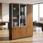 Nairobi Office Mart Wooden Office Cabinet Prices In Kenya 3-Door Wooden Office Cabinet – Stylish, Spacious & Functional Storage Keep your workspace neat and organized with the 3-Door Wooden Office Cabinet. Designed for modern offices, it combines practical storage with a professional appearance. Its wooden finish adds warmth and elegance to your office interior. Therefore, it is an excellent choice for corporate offices, home offices, and business environments. The 3-door office cabinet provides convenient storage for documents, files, stationery, and other office essentials. Its multiple doors help keep your belongings neatly arranged and out of sight. As a result, you can maintain a clean and clutter-free workspace. It is ideal for professionals who need accessible storage for everyday office supplies. Built for practical office organization, this wooden storage cabinet helps maximize available space. You can use it to store files, folders, books, and important paperwork. Furthermore, its versatile design makes it suitable for executive offices, administrative departments, reception areas, and meeting rooms. It also pairs well with executive desks and other wooden office furniture. The wooden office storage cabinet offers a professional look that complements different office layouts. Its three-door design provides a convenient way to organize items according to your needs. Additionally, the cabinet helps keep essential documents in one central location. This makes daily office activities easier and more efficient. Whether you are furnishing a new office or upgrading your existing workspace, the 3-Door Wooden Office Cabinet is a practical addition. Its combination of storage capacity, functionality, and timeless styling makes it suitable for various professional settings. Choose this cabinet to create a more organized and attractive working environment. Key Features Three-Door Design: Provides convenient access to stored office essentials. Spacious Storage: Ideal for files, folders, documents, stationery, and books. Wooden Finish: Adds a classic and professional touch to your office. Organized Workspace: Helps reduce clutter and keeps supplies neatly stored. Versatile Application: Suitable for corporate offices, home offices, and administrative spaces. Professional Appearance: Complements executive desks and other office furniture. Practical Functionality: Keeps everyday office essentials accessible and organized. Improve Your Office Organization Today Choose the 3-Door Wooden Office Cabinet for a practical and stylish storage solution. It helps maintain a tidy workspace while enhancing your office interior. Moreover, its versatile design makes it suitable for businesses of different sizes. Add this wooden office cabinet to your furniture collection and enjoy a more organized, professional working environment.